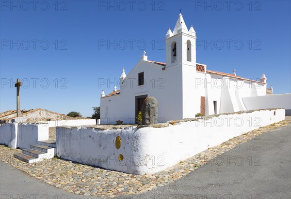 Whitewashed building rural country village catholic church Igreja Santa Barbara de Padroes, near