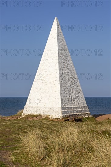 Emmanuel Head white pyramidal navigation beacon, Holy Island, Northumberland, England, UK built