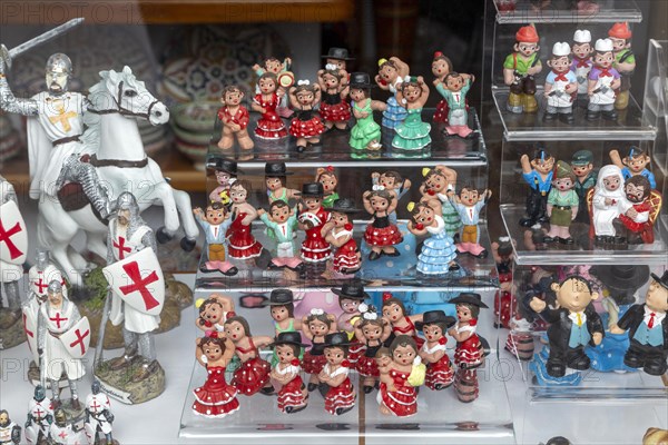 Typical Spanish souvenir products on display in shop window, Frigiliana, Axarquia, Andalusia,