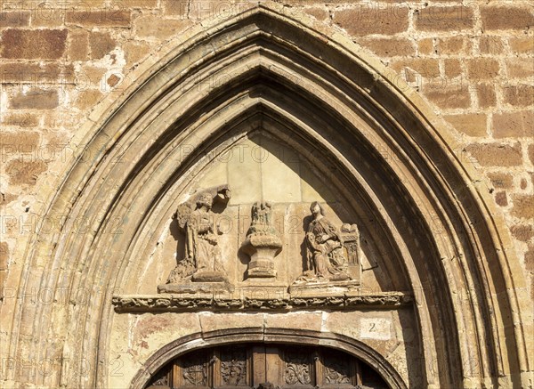 Aragonese Gothic architectural style carvings around doorway, Santa Maria la Mayor, Ezcaray, La