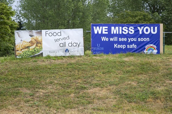 We Miss You sign on business closed during Coronavirus Covid 19 pandemic, Ufford Park, Suffolk,