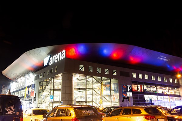Night shot of the brightly lit SAP Arena in Mannheim at an Adler Mannheim home game