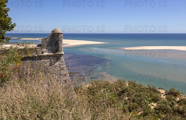 Coastal wooded landscape of pristine beaches and lagoon behind offshore sandbar, Cacela Velha, Vila