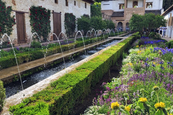 Tourists in the Patio de la Acequia, gardens with water basin, water features, Generalife Gardens,