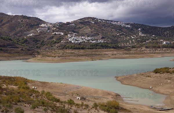 Lake Vinuela reservoir at low water level view from Hotel La Vinuela, Axarquia, Andalusia, Spain