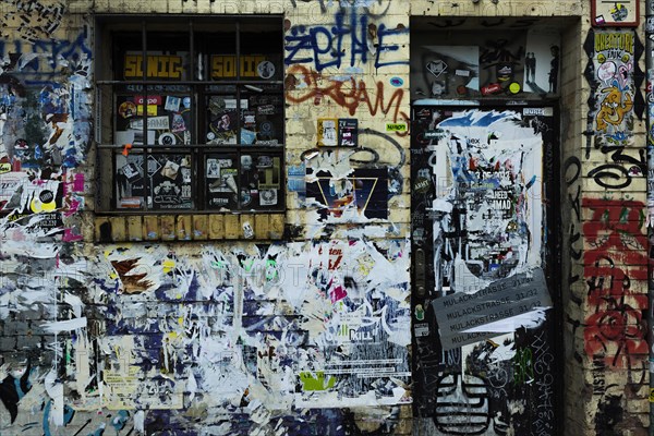 Covered wall with graffiti, texture, background, colourful, dilapidated, scene, alternative, urban,