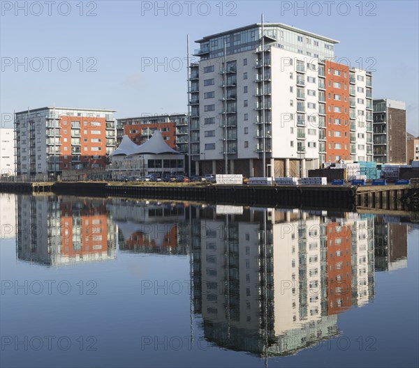 Modern apartments architecture reflected in water Ipswich Wet Dock waterside redevelopment,