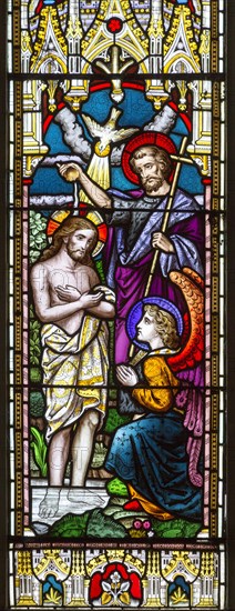 Stained glass window in church of Saint John the Baptist, Badingham, Suffolk, England, UK circa