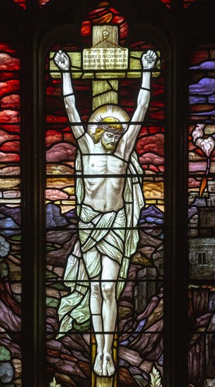 Stained glass window detail church of Saint Mary, Martlesham, Suffolk, England, UK, Crucifixion of