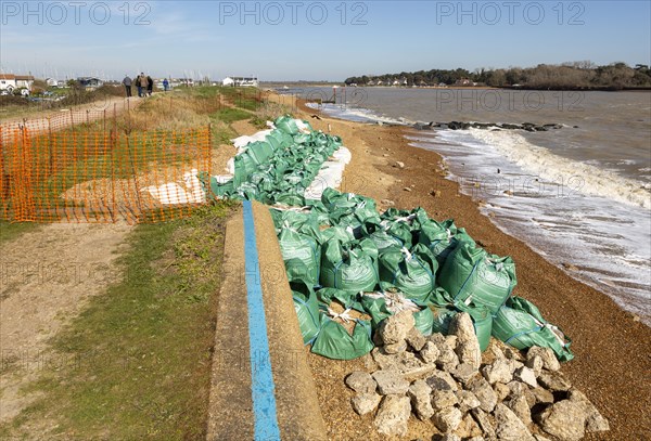 Emergency coastal defences repair work at Felixstowe Ferry, Suffolk, England, UK after storm damage