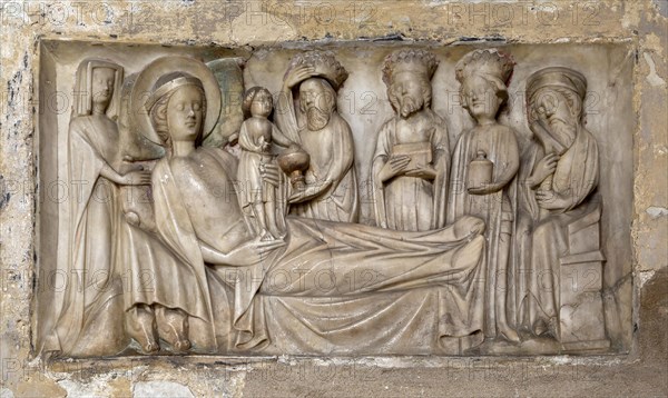 Relief carving of the Adoration of the Magi, dated to 1350, Holy Trinity Church, Long Melford,