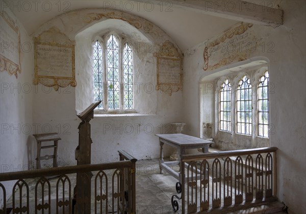 Chancel All Saints church, Leigh, Wiltshire, England, UK interior with ancient wall texts old