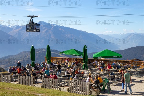 Rosshuette mountain station in Seefeld/Tyrol. Many tourists and locals take advantage of the sunny