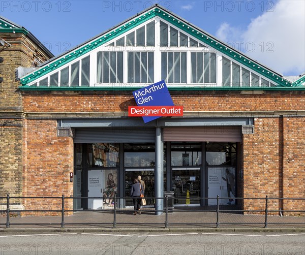 McArthur Glen designer outlet west entrance into former railway works, Swindon, Wiltshire, England,