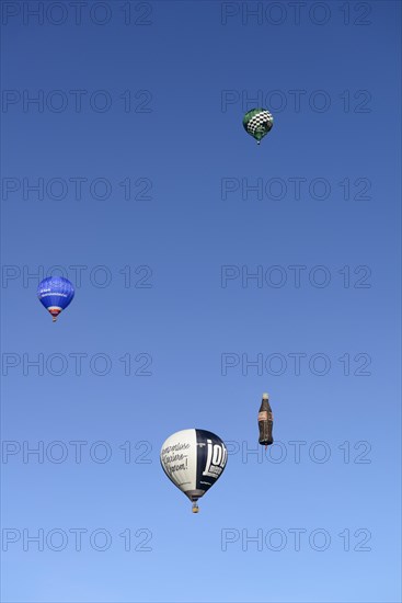Four hot air balloons in the blue sky, Montgolfiade Tegernseer Tal, Balloon Week Tegernsee,
