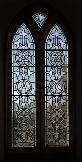 Stained glass window in church of All Saints church, South Elmham, Suffolk, England, UK late