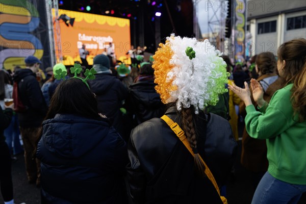 Lots of pride in being Irish on show with green hats and wigs of green, white and gold, the