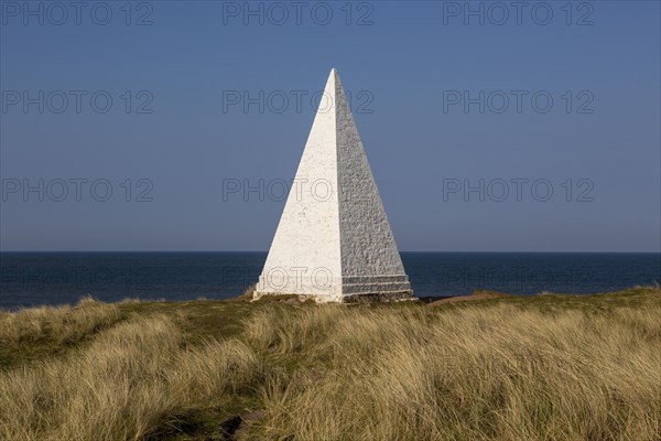 Emmanuel Head white pyramidal navigation beacon, Holy Island, Northumberland, England, UK built