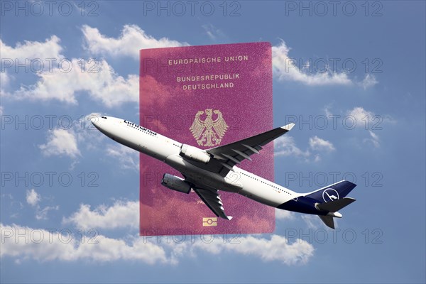 Symbolic image: Lufthansa passenger aircraft taking off, in the background a passport of the