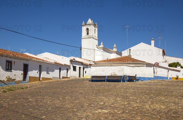Small traditional rural settlement village with low rise one story houses and cobbled streets,