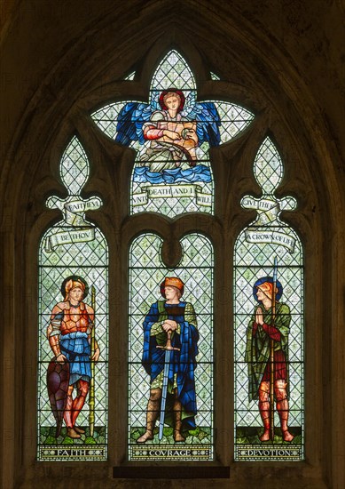 Stained glass window in Malmesbury abbey, Wiltshire, England, UK, Faith, Courage, Devotion by