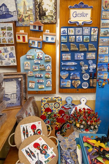 Close up tourist souvenir products on sale including fridge magnets, city of Evora, Alto Alentejo,