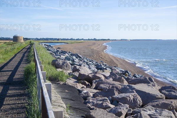 Shingle bay bar and lagoon landforms with rock armour coastal defences at Bawdsey, Suffolk,