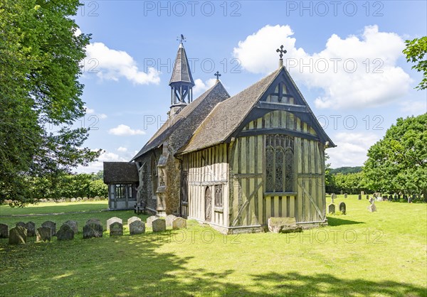 Village parish church of All Saints, Crowfield, Suffolk, England, UK with wooden timber framed