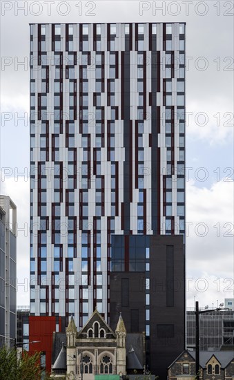 Architectural contrast between small old and tall modern buildings, Cardiff city centre, South