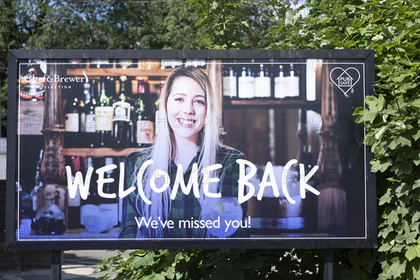 Welcome Back poster sign outside Chef and Brewer pub chain at Martlesham, Suffolk, England, UK July