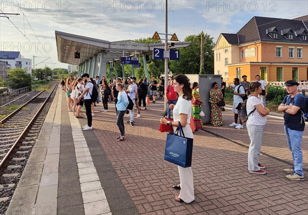 Many people waiting on the platform for the train, Luenen Central Station, North Rhine-Westphalia,