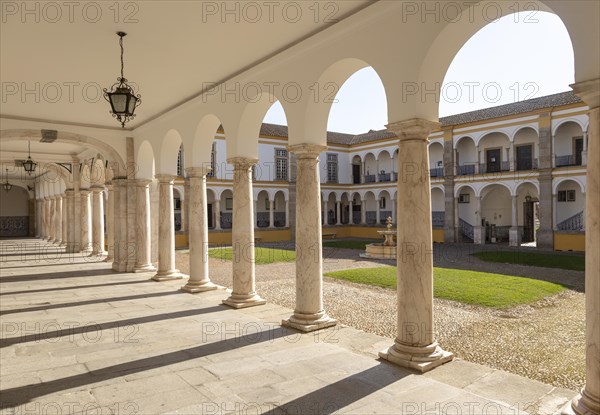 Cloisters collonade marble columns historic courtyard Evora University, Evora, Alto Alentejo,