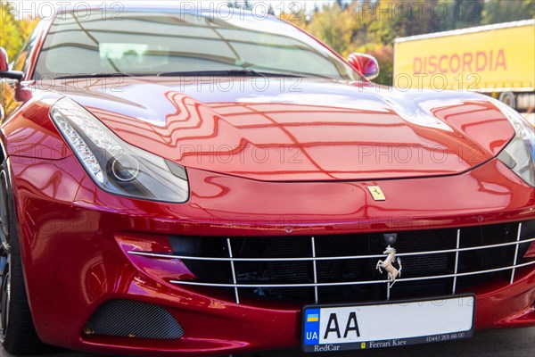Close-up of a red Ferrari FF (seen at the Ellwanger Berge motorway service area,