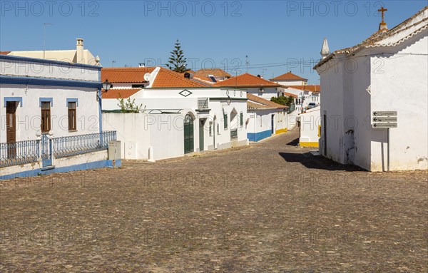 Small traditional rural settlement village with low rise one story houses and cobbled streets,