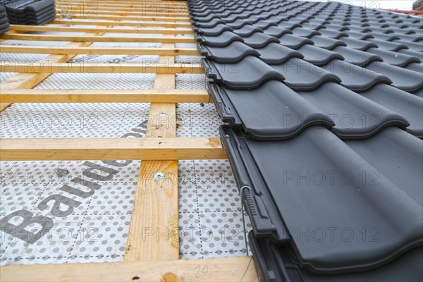 Roofing work, re-roofing of a tiled roof