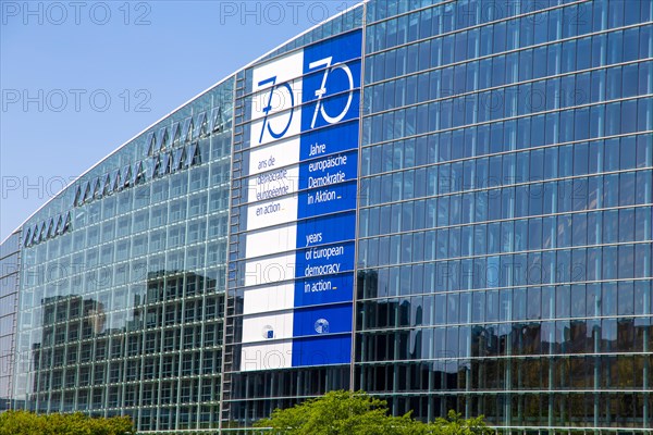 The back of the European Parliament in Strasbourg On the glass facade you can see a huge banner