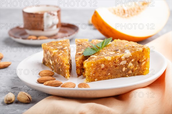 Traditional turkish candy cezerye made from caramelised melon, roasted walnuts, hazelnuts, cashew,