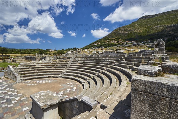 Ancient amphitheatre with stone seats and ruins in Greece, sanctuary of Asclepius, Ecclesiasterion,