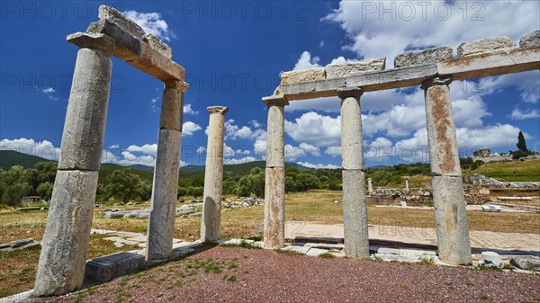 The remains of an ancient columned structure on a sunny day, Stoa of the Agora, Archaeological
