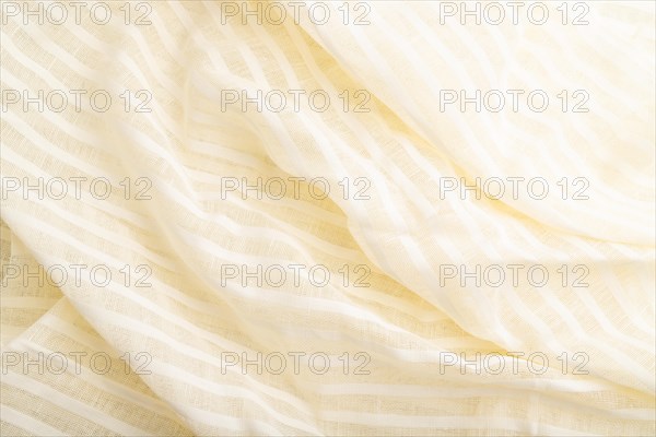 Fragment of white linen tissue. Top view, flat lay, natural textile background and texture. wave