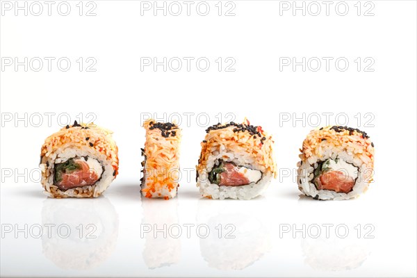 Four Japanese maki sushi rolls in a row with salmon, sesame and cream cheese isolated on white