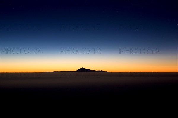 View from Roque de los Muchachos to mount Pico de Teide on Tenerife in the early morning, La Palma,