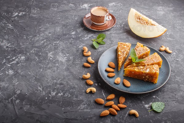 Traditional turkish candy cezerye made from caramelised melon, roasted walnuts, hazelnuts, cashew,