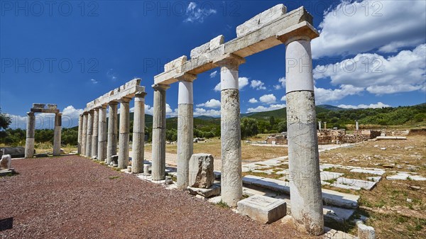 A row of ancient marble columns against a blue sky, Stoa of the Agora, Archaeological site, Ancient