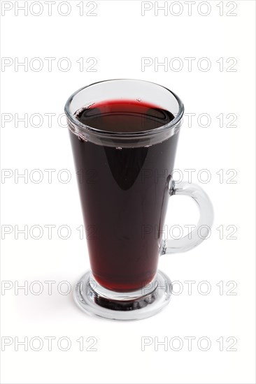 Glass of red grape juice isolated on white background. Morninig, spring, healthy drink concept.
