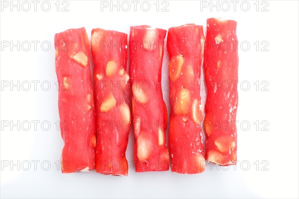 Red traditional turkish delight (rahat lokum) with peanuts isolated on white background. top view,