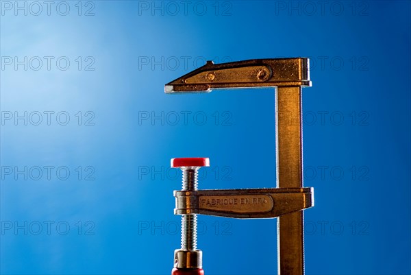 Open clamp in a workshop of a joiner