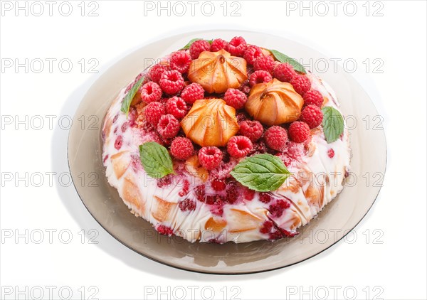 Homemade jelly cake with milk, cookies and raspberry isolated on white background. side view. close