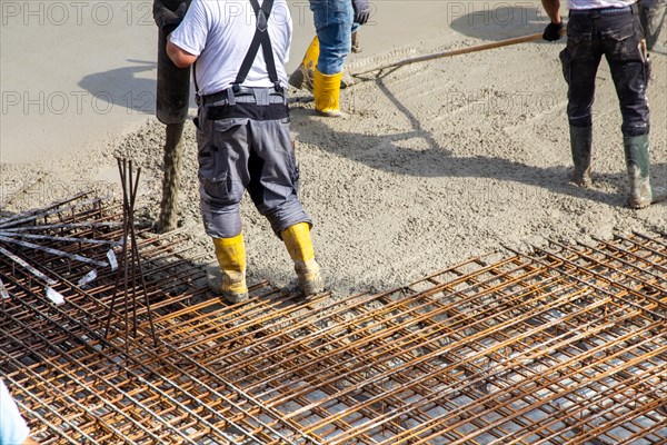 Delivery of ready-mixed concrete to the construction site of a residential building in a new