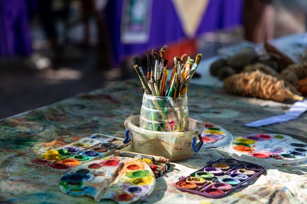 Painting utensils of an artist at the Mercado Organico in Santa Crzu, Pochutla, Baja de Huatulco,